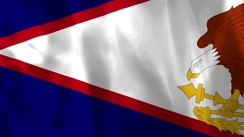 Waving flag of American Samoa featuring a white triangle and bald eagle desig 库存影片 343582064