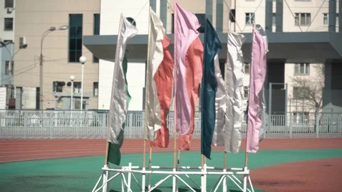 Waving a flag in the background of the stadium Stock Footage 89622279