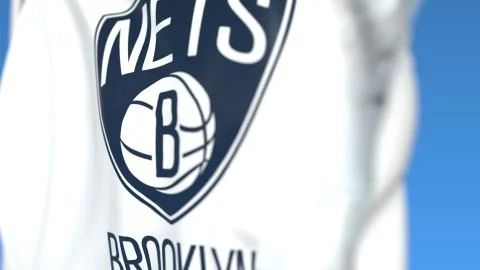 Waving flag with Brooklyn Nets team logo, close-up. Editorial 3D rendering Stock Illustration