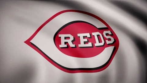 Waving flag with Cincinnati Reds professional team logo. Editorial clip Stock Footage 104782544