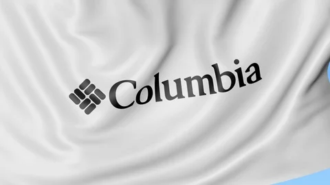 Waving flag with Columbia Sportswear logo. Seamles loop 4K editorial animation Stock Footage