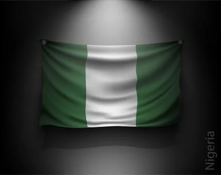 Waving flag on a dark wall with a spotlight, illuminated Illustrazione stock