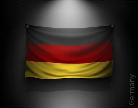 Waving flag on a dark wall with a spotlight, illuminated Illustrazione stock