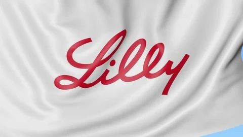 Waving flag with Eli Lilly And Company logo. Seamles loop 4K editorial animation Stock Footage