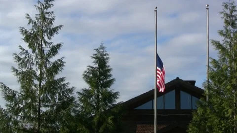 Waving flag at half mast Stock Footage 70729721