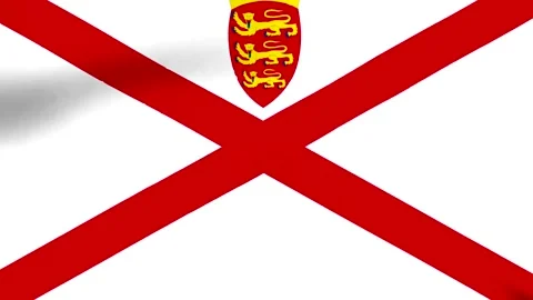 Waving flag of Jersey featuring the red saltire on a white field with the r.. 스톡 동영상 346546007