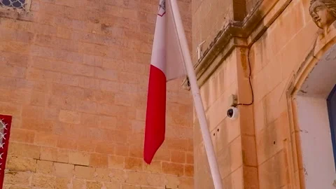 Waving flag of Malta at the wall Stock Footage 293705350