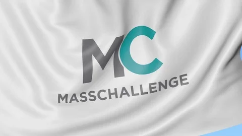 Waving flag with MassChallenge logo. Seamless loop 4K editorial animation Stock Footage 76243287