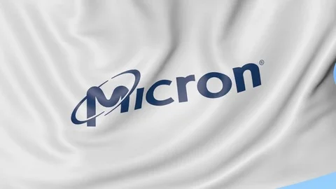 Waving flag with Micron Technology logo. Seamles loop 4K editorial animation Stock Footage