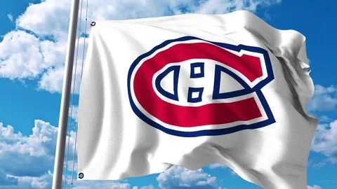 Waving flag with Montreal Canadiens NHL hockey team logo. 4K editorial clip Stock Footage