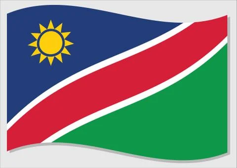 Waving flag of Namibia vector graphic. Waving Namibian flag illustration. Nam Illustrazione stock