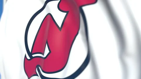 Waving flag with New Jersey Devils NHL hockey team logo, close-up. Editorial 3D 스톡 일러스트