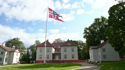 Waving flag of Norway at Eidsvoll Manor House, 4K Stock Footage 161629813