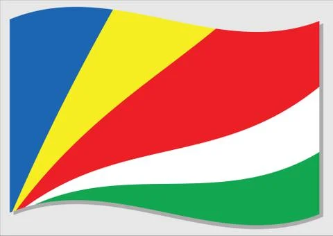 Waving flag of Seychelles vector graphic. Waving Seychellois flag illustratio Illustrazione stock