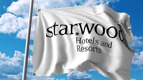 Waving flag with Starwood logo. 4K editorial animation Stock Footage
