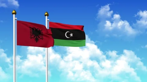 Waving flags of ALBANIA and LIBYA on pole included with alpha channel Stock Footage 309367196