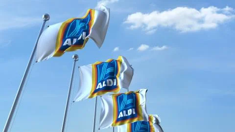 Waving flags with Aldi logo against sky, editorial 3D rendering Stock-Illustration