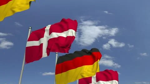 Waving flags of Denmark and Germany on sky background, 3D rendering Stock Illustration