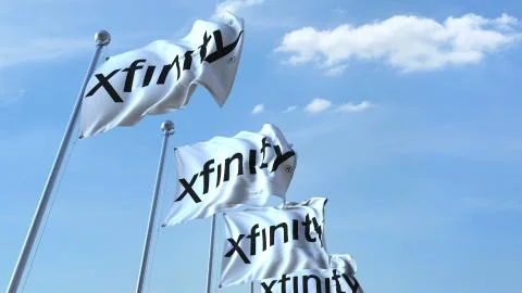 Waving flags with Xfinity logo against sky, editorial 3D rendering Stock Illustration