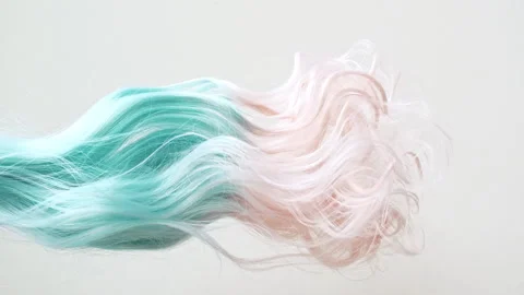 Waving of locks of blue, pink shiny wavy bunch hair. Slow Motion. Hair care and Stock Footage 270930959
