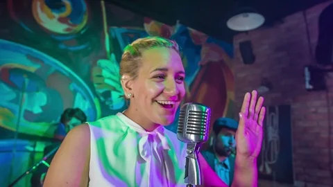 Waving at someone in the crowd Stock Footage 112190664