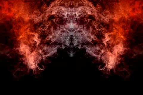 Waving, translucent smoke, illuminated by light against a dark background, di Stock Photos