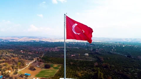 Waving Turkish flag - Image of waving Turkish flag taken by drone Stock Footage 309111848