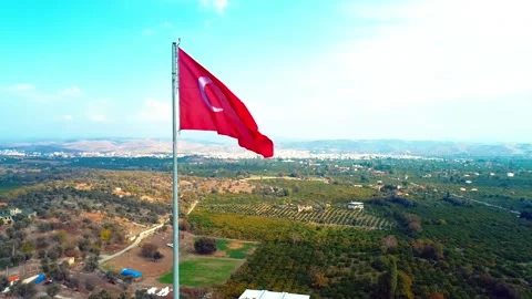 Waving Turkish flag - Image of waving Turkish flag taken by drone Stock Footage 309111859