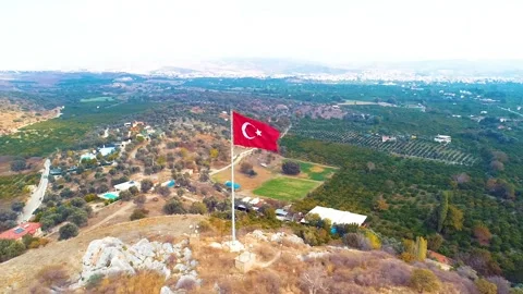 Waving Turkish flag - Image of waving Turkish flag taken by drone Stock Footage 309111864