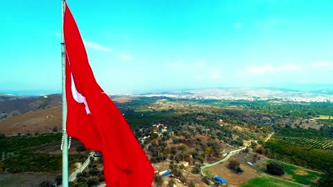 Waving Turkish flag - Image of waving Turkish flag taken by drone Stock Footage 309111865