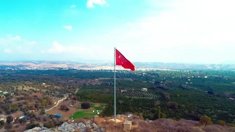 Waving Turkish flag - Image of waving Turkish flag taken by drone Stock Footage 309111872
