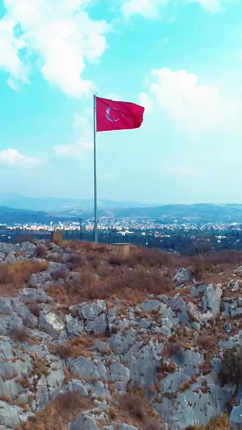 Waving Turkish flag - Image of waving Turkish flag taken by drone Stock Footage 309112015