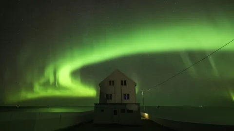 Wavy Aurora Borealis with lighthouse Stock Footage 266917382