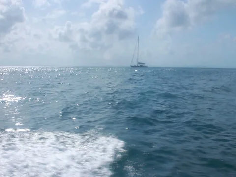 Wavy boat ride on a dramatic sea journey. Stock Footage 77820420