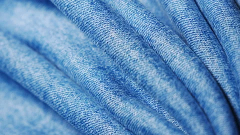 Wavy denim surface. Microtexture. The classic fabric for making jeans. Seams Stock Footage 144370345