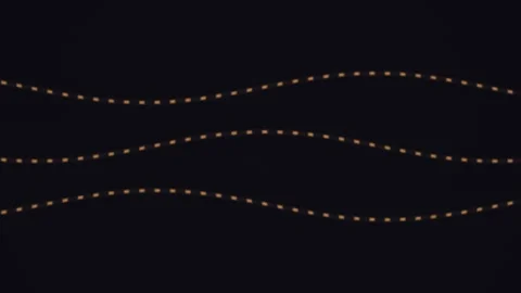 Wavy lines with dotted pattern on dark background for Stock Footage 338175673