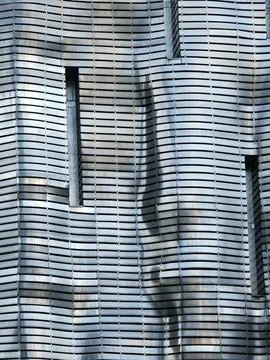 Wavy metallic building facade Stock Photos