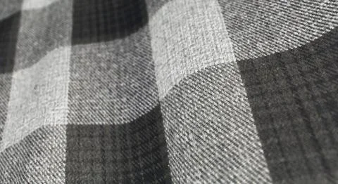 Wavy pattern of gray checkered fabric closeup 스톡 사진