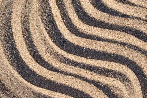 Wavy pattern of natural beach sand background for summer designs 스톡 사진