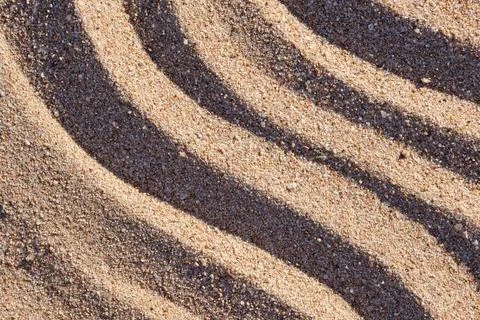 Wavy pattern of natural beach sand background for summer designs 스톡 사진