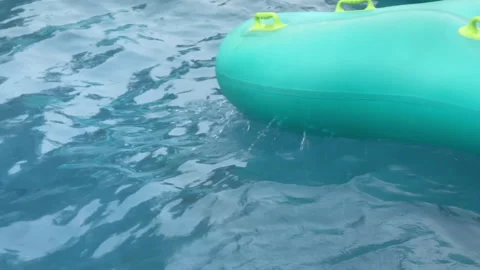 A wavy pool with a single life buoy on it Stock Footage 255696144