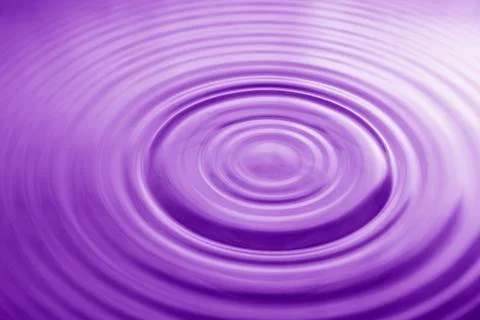 Wavy water surface circle purple proton Stock Photos