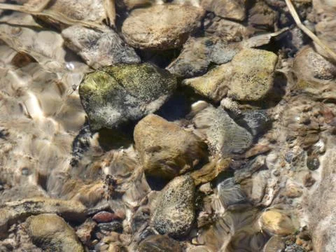 Wavy Water Surface (Rocks) Stock Photos