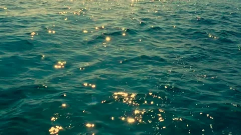 Wavy water surface with sunlight reflections in sea Stock Footage 154634089
