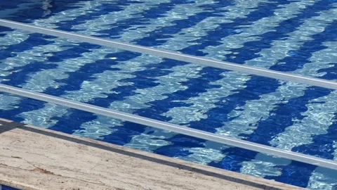 Wavy waters of the swimming pool Stock Footage 245843592
