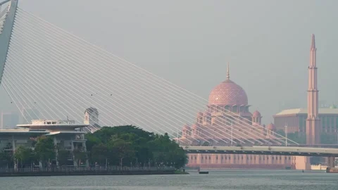 Wawasan Bridge with Putra Mosque in background, in Putrajaya at day Stock Footage 346349357