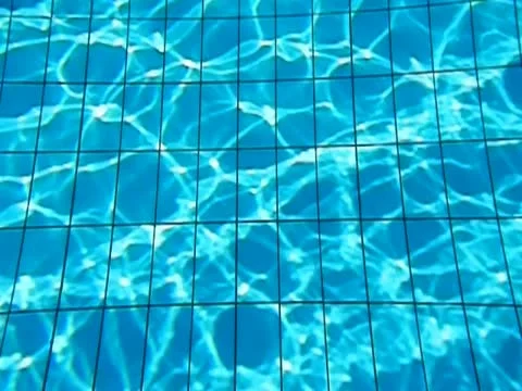 Wawes in pool. Sun Reflections. Stock Footage 12030759