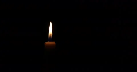 Wax candle flame light glowing without air flickering silent in the dark zoom Stock Footage 172425229