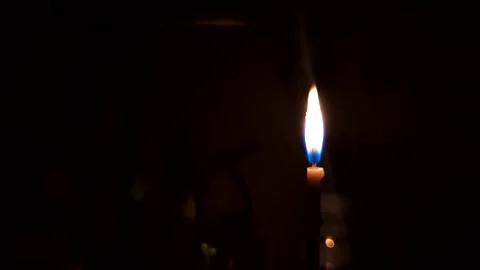 Wax candle light at night Stock Footage 244340099