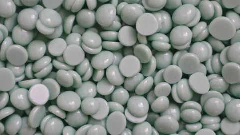 Wax granules for depilation. Background wax texture. Rotation. View from above. Stock-Footage 237016845